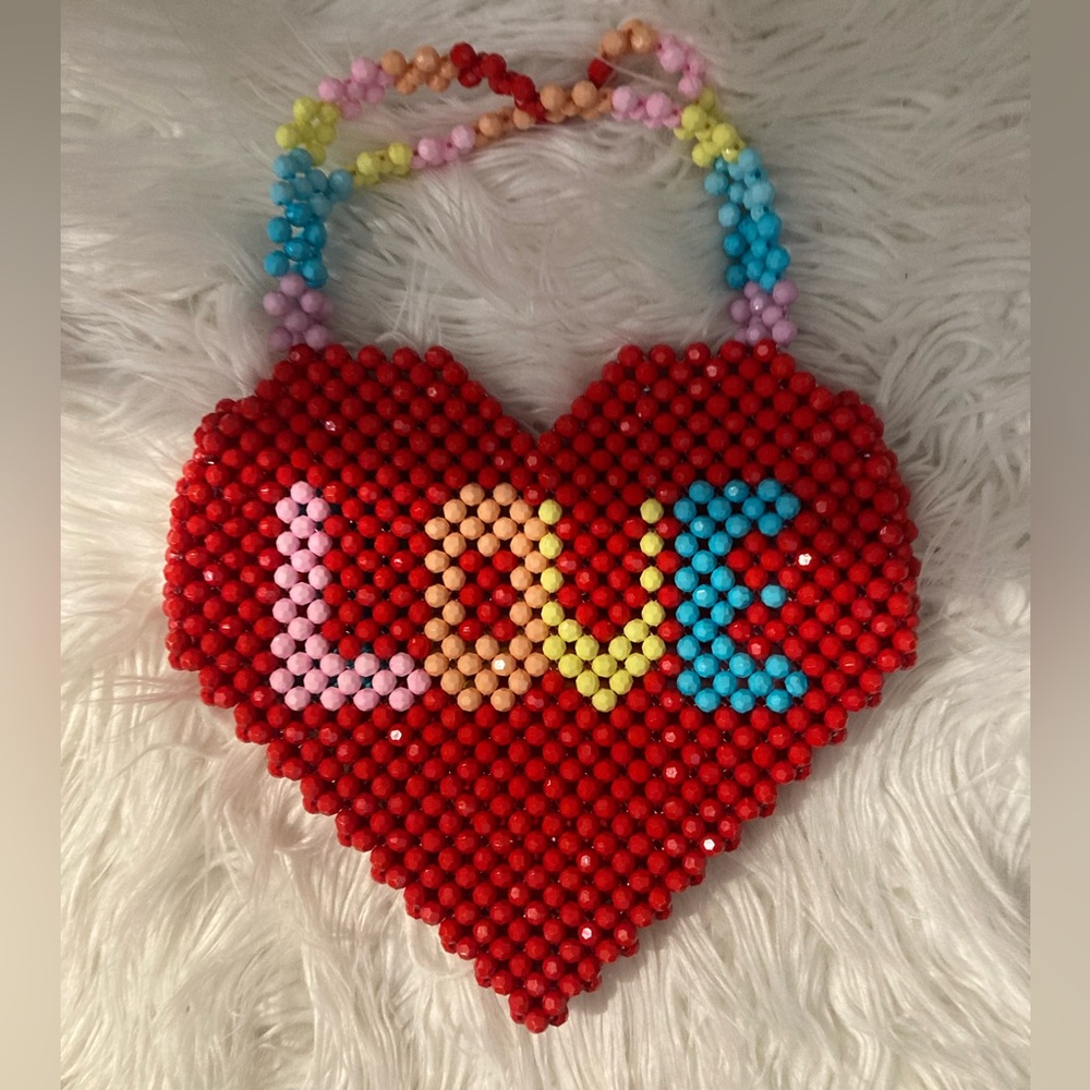 Hand beaded heart shaped purse